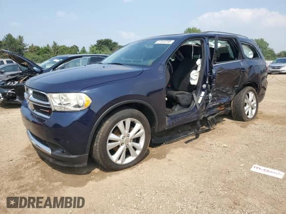 2012 Dodge Durango SXT with VIN 1C4RDJAG2CC312465, listed as a Copart auction lot 67049795 with 194,265 mi miles and Salvage title. Bid and sale history available at DreamBid. Image 1.