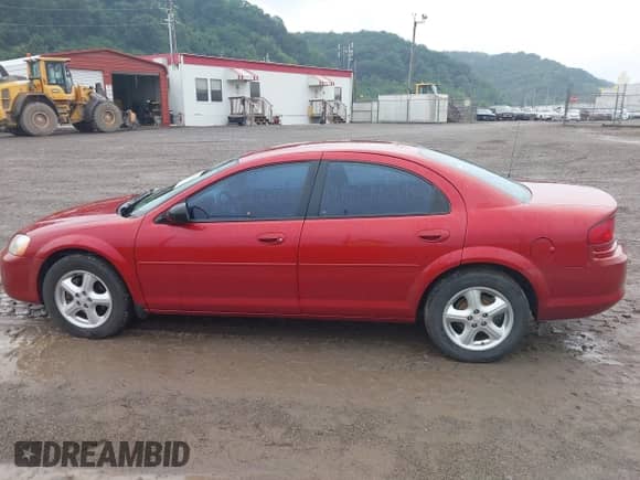 2005 Dodge Stratus SXT with VIN 1B3EL46R25N703587, listed as a IAAI auction lot 42632629 with 164,579 mi miles and . Bid and sale history available at DreamBid. Image 14.