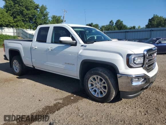 2018 GMC Sierra 1500 SLE z VIN 2GTV2MECXJ1110666, wystawiony jako Copart lot #65382475 z przebiegiem Nie podano mil oraz Czysty tytuł • Clean title. Historia ofert i sprzedaży dostępna na DreamBid. Obrazek 4.