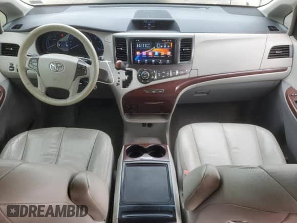 2012 Toyota Sienna XLE with VIN 5TDYK3DCXCS278781, listed as a Copart auction lot 83769325 with 157,885 mi miles and Salvage title. Bid and sale history available at DreamBid. Image 8.