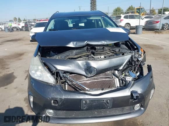 2012 Toyota Prius Two with VIN JTDZN3EU4C3083974, listed as a IAAI auction lot 43239007 with 156,219 mi miles and . Bid and sale history available at DreamBid. Image 12.