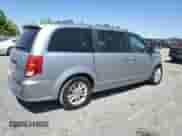 2018 Dodge Grand Caravan SXT with VIN 2C4RDGCGXJR282636, listed as a Copart auction lot 67184175 with 99,430 mi miles and Salvage title. Bid and sale history available at DreamBid. Image 3.