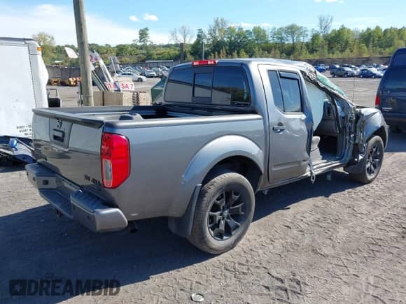 2021 Nissan Frontier Pro-4X with VIN 1N6ED0EB7MN708854, listed as a IAAI auction lot 43356558 with 20,820 mi miles and . Bid and sale history available at DreamBid. Image 4.
