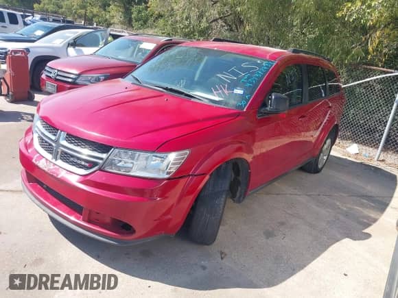 2013 Dodge Journey American Value with VIN 3C4PDCAB9DT668957, listed as a IAAI auction lot 43437243 with 163,648 mi miles and . Bid and sale history available at DreamBid. Image 2.