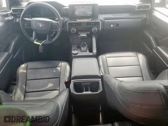 2025 Toyota Tacoma SR z VIN 3TYLD5KN7ST012612, wystawiony jako Copart lot #81234075 z przebiegiem 8 053 mil mil oraz Szkoda całkowita • Salvage title. Historia ofert i sprzedaży dostępna na DreamBid. Obrazek 8.