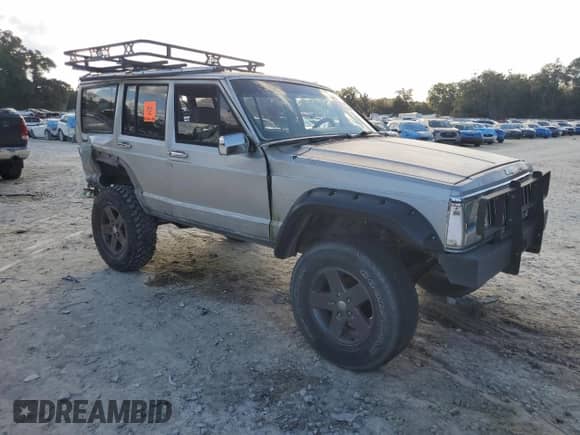 1992 Jeep Grand Cherokee with VIN 1J4FJ58S2NL104208, listed as a Copart auction lot 85580484 with 171,210 mi miles and Salvage title. Bid and sale history available at DreamBid. Image 4.