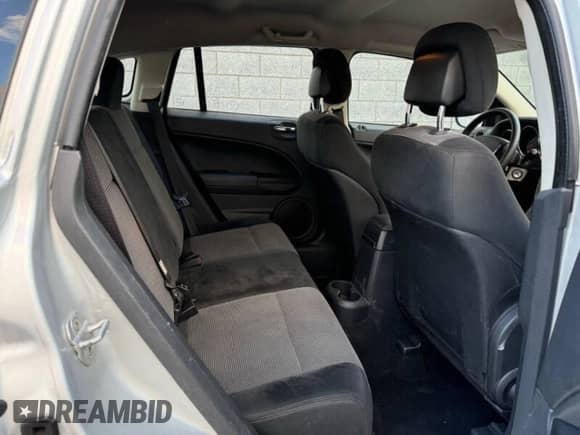 2010 Dodge Caliber SXT с VIN 1B3CB4HA1AD579409, выставлен на аукционе Copart как лот 91408935 с пробегом 100 311 миль миль и Чистый • Clean title. История ставок и продаж доступна на DreamBid. Изображение 6.