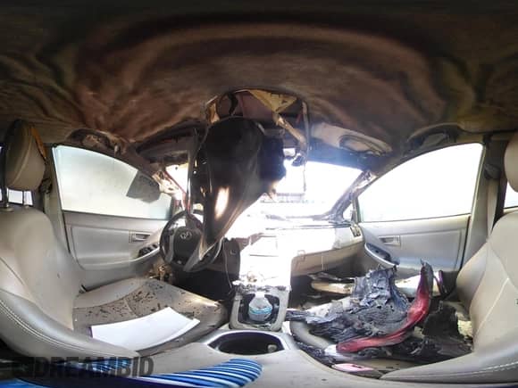 2013 Toyota Prius One z VIN JTDKN3DU1D5562216, wystawiony jako IAAI lot #42653772 z przebiegiem Nie podano mil oraz . Historia ofert i sprzedaży dostępna na DreamBid. Obrazek 18.