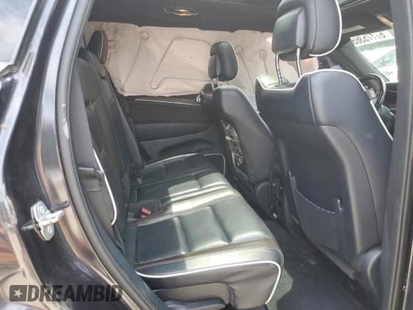 2015 Jeep Grand Cherokee Overland с VIN 1C4RJFCT0FC113614, выставлен на аукционе Copart как лот 67475365 с пробегом 122 094 миль миль и Списание • Salvage title. История ставок и продаж доступна на DreamBid. Изображение 11.