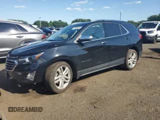 2018 Chevrolet Equinox Premier with VIN 2GNAXWEX6J6321436, listed as a Copart auction lot 63066895 with 65,101 mi miles and Salvage title. Bid and sale history available at DreamBid. Image 1.