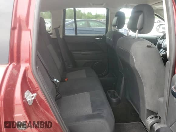 2014 Jeep Compass Sport z VIN 1C4NJCBB0ED865621, wystawiony jako Copart lot #52941835 z przebiegiem 93 487 mil mil oraz Szkoda całkowita • Salvage title. Historia ofert i sprzedaży dostępna na DreamBid. Obrazek 11.