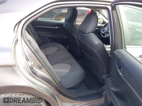 2021 Toyota Camry Hybrid LE with VIN 4T1H31AK0MU553127, listed as a IAAI auction lot 43099811 with 27,442 mi miles and . Bid and sale history available at DreamBid. Image 8.