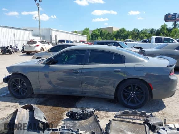 2018 Dodge Charger SXT Plus with VIN 2C3CDXHG1JH167383, listed as a IAAI auction lot 42826149 with 122,871 mi miles and . Bid and sale history available at DreamBid. Image 15.