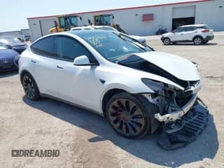 2023 Tesla Model Y Performance with VIN 7SAYGDEF2PF802809, listed as a IAAI auction lot 42931138 with 23,962 mi miles and . Bid and sale history available at DreamBid. Image 1.