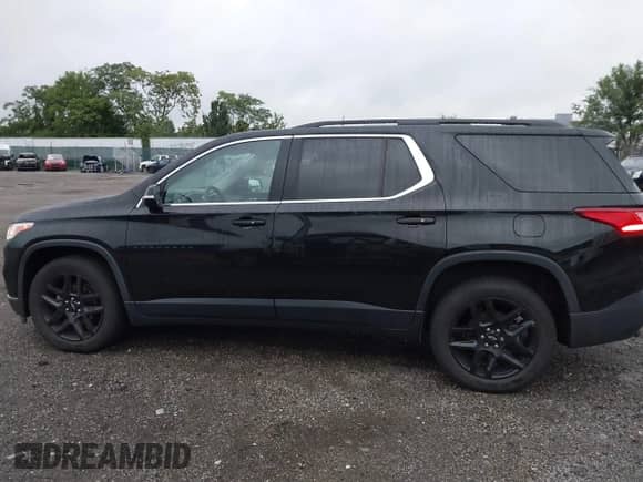2019 Chevrolet Traverse LT Cloth z VIN 1GNEVGKW3KJ149900, wystawiony jako IAAI lot #42875473 z przebiegiem 134 707 mil mil oraz . Historia ofert i sprzedaży dostępna na DreamBid. Obrazek 14.