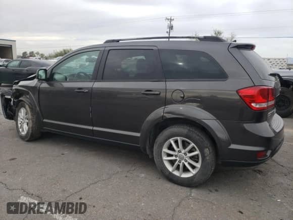 2017 Dodge Journey SXT with VIN 3C4PDDBG4HT654003, listed as a Copart auction lot 66204752 with 87,919 mi miles and Salvage title. Bid and sale history available at DreamBid. Image 2.