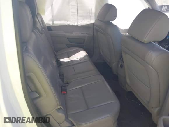 2015 Honda Pilot EX-L с VIN 5FNYF4H57FB009734, выставлен на аукционе IAAI как лот 42551082 с пробегом 157 453 миль миль и . История ставок и продаж доступна на DreamBid. Изображение 8.