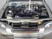 2003 Nissan Frontier XE z VIN 1N6ED27Y83C444714, wystawiony jako Copart lot #64688395 z przebiegiem 190 898 mil mil oraz Czysty tytuł • Clean title. Historia ofert i sprzedaży dostępna na DreamBid. Obrazek 11.