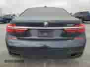 2019 BMW 7 Series 750i with VIN WBA7F0C57KGM24657, listed as a Copart auction lot 84496664 with 105,864 mi miles and Salvage title. Bid and sale history available at DreamBid. Image 6.