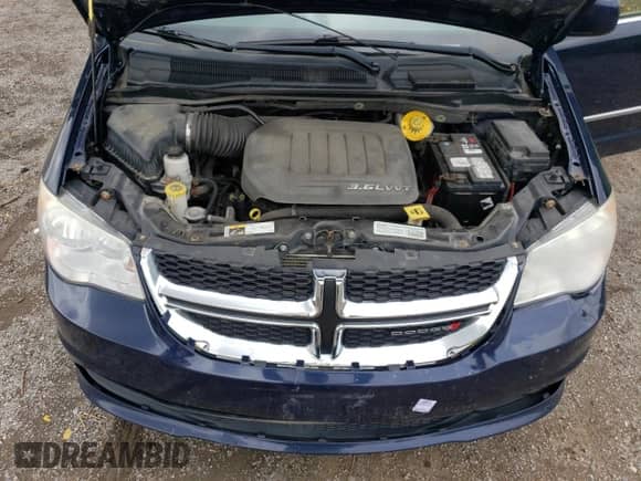 2014 Dodge Grand Caravan Crew z VIN 2C4RDGDG0ER327345, wystawiony jako Copart lot #66422375 z przebiegiem 221 569 mil mil oraz Czysty tytuł • Clean title. Historia ofert i sprzedaży dostępna na DreamBid. Obrazek 12.