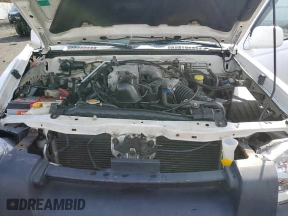 2002 Nissan Frontier SVE z VIN 1N6MD26Y52C354836, wystawiony jako Copart lot #43410425 z przebiegiem Nie podano mil oraz Szkoda całkowita • Salvage title. Historia ofert i sprzedaży dostępna na DreamBid. Obrazek 11.