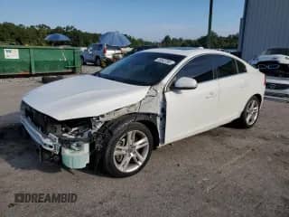 2014 Volvo S60 T5 с VIN YV1612FS5E2274294, выставлен на аукционе Copart как лот 82078085 с пробегом 140 398 миль миль и Списание • Salvage title. История ставок и продаж доступна на DreamBid. Изображение 1.