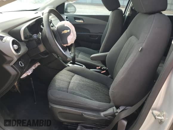 2017 Chevrolet Sonic LT with VIN 1G1JD5SB4H4124726, listed as a Copart auction lot 54689445 with 136,011 mi miles and Salvage title. Bid and sale history available at DreamBid. Image 7.