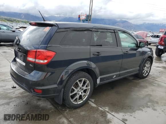 2012 Dodge Journey R/T with VIN 3C4PDDEG2CT396956, listed as a Copart auction lot 54870095 with 129,713 mi miles and Salvage title. Bid and sale history available at DreamBid. Image 3.