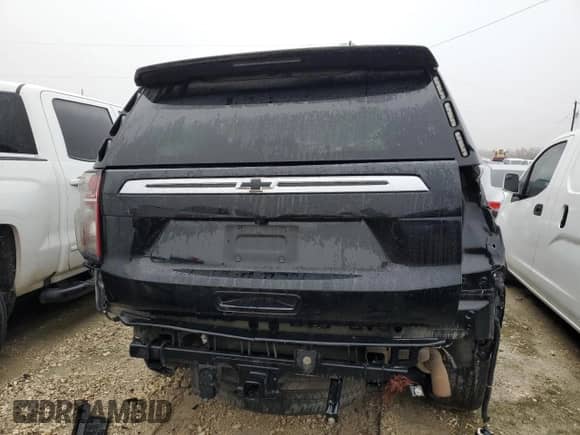 2021 Chevrolet Tahoe with VIN 1GBSCLED8MR340841, listed as a Copart auction lot 82027613 with Not provided miles and Salvage title. Bid and sale history available at DreamBid. Image 6.