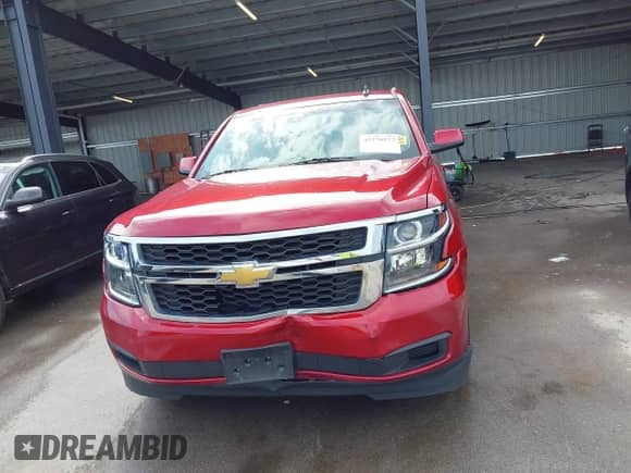 2015 Chevrolet Tahoe LT z VIN 1GNSKBKC9FR126438, wystawiony jako IAAI lot #43276273 z przebiegiem 92 503 mil mil oraz . Historia ofert i sprzedaży dostępna na DreamBid. Obrazek 12.