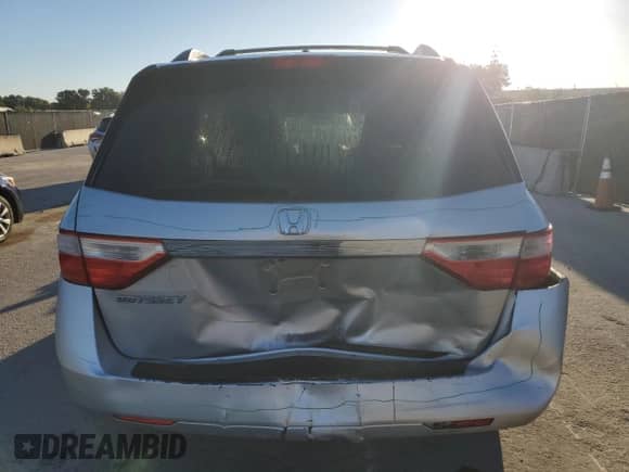 2013 Honda Odyssey EX-L z VIN 5FNRL5H63DB042917, wystawiony jako Copart lot #86450745 z przebiegiem 223 098 mil mil oraz Szkoda całkowita • Salvage title. Historia ofert i sprzedaży dostępna na DreamBid. Obrazek 6.