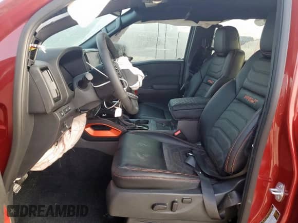 2025 Nissan Frontier Pro-X with VIN 1N6ED1EJXSN637854, listed as a Copart auction lot 65409335 with 2,410 mi miles and Salvage title. Bid and sale history available at DreamBid. Image 7.