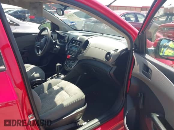 2015 Chevrolet Sonic LS with VIN 1G1JA6SH8F4159267, listed as a IAAI auction lot 42705619 with 116,650 mi miles and . Bid and sale history available at DreamBid. Image 5.