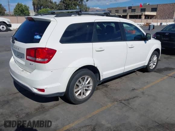 2015 Dodge Journey SXT with VIN 3C4PDCBB3FT692236, listed as a IAAI auction lot 43184383 with Not provided miles and . Bid and sale history available at DreamBid. Image 4.