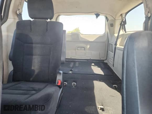 2015 Dodge Grand Caravan SXT z VIN 2C4RDGCG4FR745801, wystawiony jako Copart lot #71855195 z przebiegiem 182 889 mil mil oraz Czysty tytuł • Clean title. Historia ofert i sprzedaży dostępna na DreamBid. Obrazek 10.