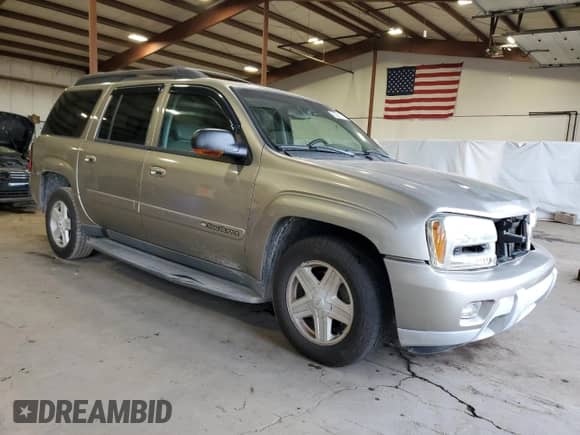 2002 Chevrolet TrailBlazer EXT LT z VIN 1GNET16S326119082, wystawiony jako Copart lot #83813225 z przebiegiem 156 961 mil mil oraz Szkoda całkowita • Salvage title. Historia ofert i sprzedaży dostępna na DreamBid. Obrazek 4.