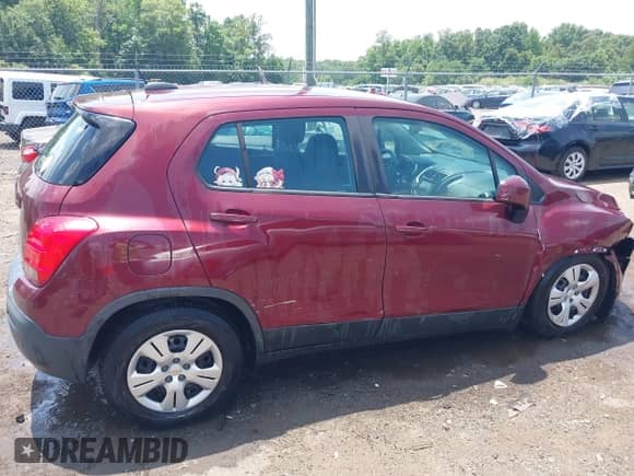 2016 Chevrolet Trax LS z VIN 3GNCJKSB2GL268055, wystawiony jako IAAI lot #42571496 z przebiegiem 152 261 mil mil oraz . Historia ofert i sprzedaży dostępna na DreamBid. Obrazek 13.