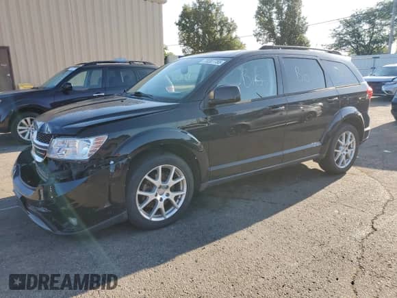 2014 Dodge Journey SXT with VIN 3C4PDCBG5ET153224, listed as a Copart auction lot 70207755 with 123,051 mi miles and Salvage title. Bid and sale history available at DreamBid. Image 1.