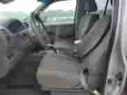 2007 Nissan Frontier SE z VIN 1N6AD09U87C456591, wystawiony jako Copart lot #63693815 z przebiegiem 209 159 mil mil oraz Szkoda całkowita • Salvage title. Historia ofert i sprzedaży dostępna na DreamBid. Obrazek 7.