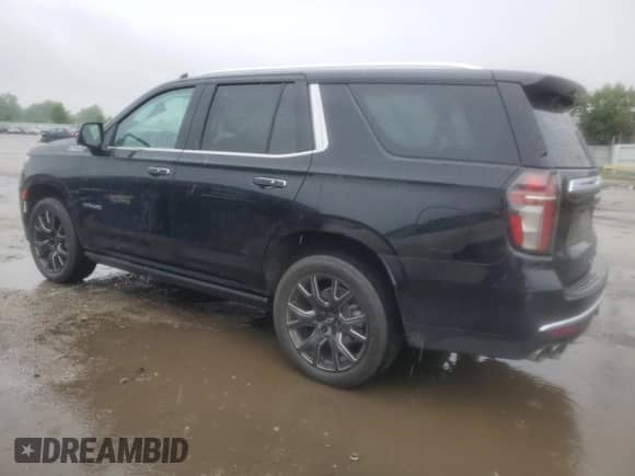 2021 Chevrolet Tahoe High Country with VIN 1GNSKTKL8MR107589, listed as a Copart auction lot 59603285 with 64,479 mi miles and Salvage title. Bid and sale history available at DreamBid. Image 2.
