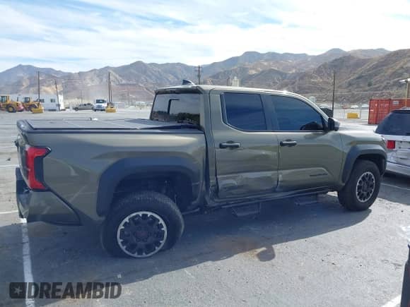 2024 Toyota Tacoma SR5 with VIN 3TMLB5JN6RM027745, listed as a IAAI auction lot 41479793 with 16,376 mi miles and . Bid and sale history available at DreamBid. Image 13.