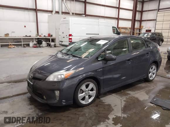 2013 Toyota Prius Three z VIN JTDKN3DU4D5647440, wystawiony jako IAAI lot #43405951 z przebiegiem 86 263 mil mil oraz . Historia ofert i sprzedaży dostępna na DreamBid. Obrazek 2.