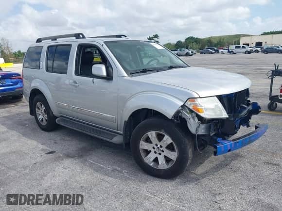 2011 Nissan Pathfinder LE z VIN 5N1AR1NB9BC628744, wystawiony jako IAAI lot #41975483 z przebiegiem 93 632 mil mil oraz . Historia ofert i sprzedaży dostępna na DreamBid. Obrazek 1.