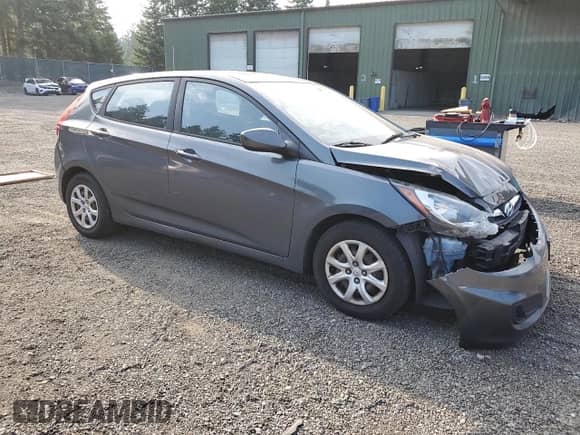 2012 Hyundai Accent GS with VIN KMHCT5AE7CU011159, listed as a Copart auction lot 70052815 with 156,055 mi miles and Salvage title. Bid and sale history available at DreamBid. Image 4.