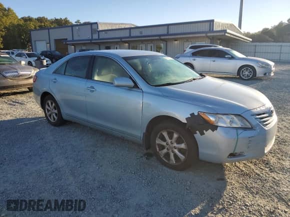 2007 Toyota Camry CE с VIN 4T1BE46KX7U713738, выставлен на аукционе Copart как лот 86875575 с пробегом 295 189 миль миль и Списание • Salvage title. История ставок и продаж доступна на DreamBid. Изображение 4.
