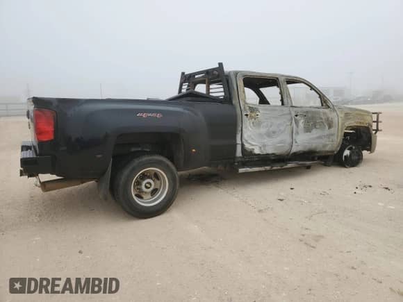 2015 Chevrolet Silverado 3500HD LTZ с VIN 1GC4K0C88FF624728, выставлен на аукционе Copart как лот 44182945 с пробегом Не указан миль и На запчасти • Non repairable. История ставок и продаж доступна на DreamBid. Изображение 3.