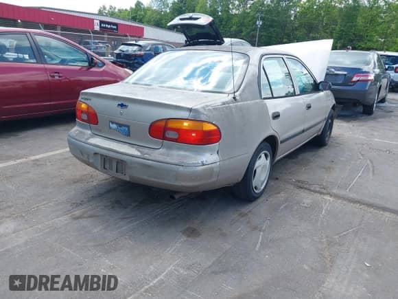2002 Chevrolet Prizm z VIN 1Y1SK52802Z408768, wystawiony jako IAAI lot #42241540 z przebiegiem 276 083 mil mil oraz . Historia ofert i sprzedaży dostępna na DreamBid. Obrazek 4.