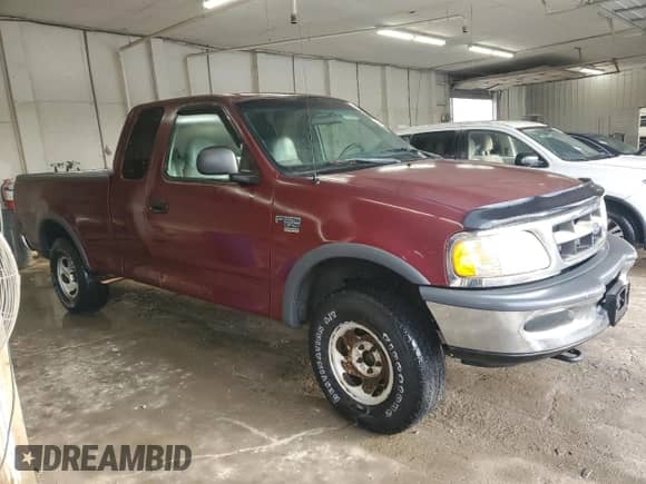 1998 Ford F-150 с VIN 1FTZX186XWNA24450, выставлен на аукционе Copart как лот 85858725 с пробегом 163 158 миль миль и Списание • Salvage title. История ставок и продаж доступна на DreamBid. Изображение 4.