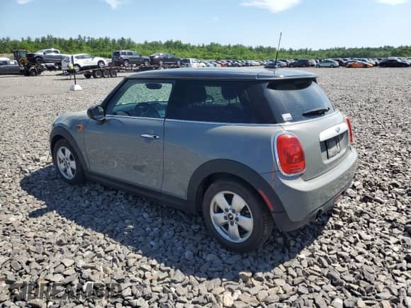 2014 MINI Hardtop with VIN WMWXM5C51ET933450, listed as a Copart auction lot 56686374 with 82,100 mi miles and Salvage title. Bid and sale history available at DreamBid. Image 2.
