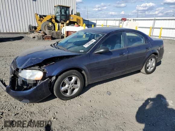 2006 Dodge Stratus SXT with VIN 1B3EL46R46N185788, listed as a Copart auction lot 71580104 with 104,390 mi miles and Salvage title. Bid and sale history available at DreamBid. Image 1.